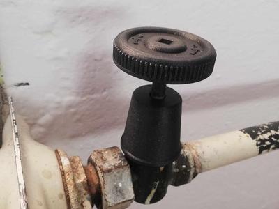 Old radiator knob with cover