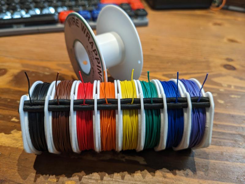 Wire wrapping wire multi-spool