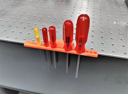 Optical table mountable tool holder