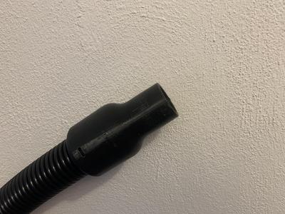 end cap on the universal hose for the vacuum cleaner.