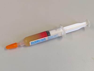 Cap for soldering flux syringe