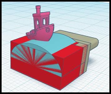 usb a cover with benchy on  it