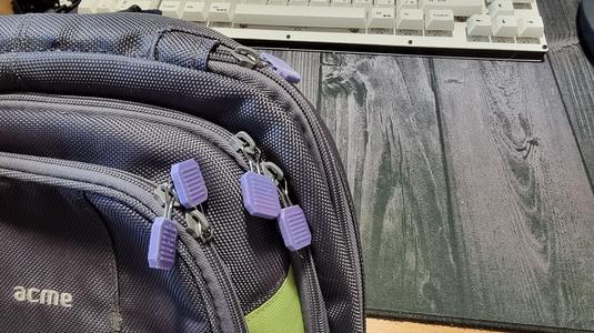 Binder clip zipper pull