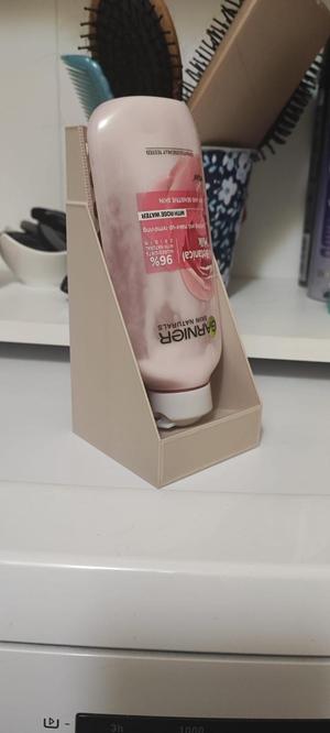 Holder for shower gel/hand cream etc.  (drain down completely) 