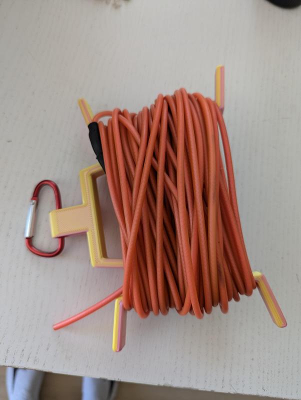 Cord Winder with carabin hook attachment