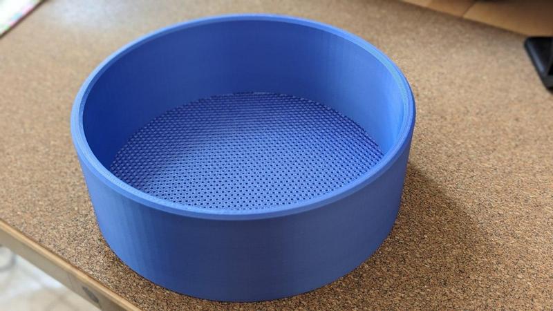 Sieve with 2mm hex holes, 210mm diameter, 70mm height.
