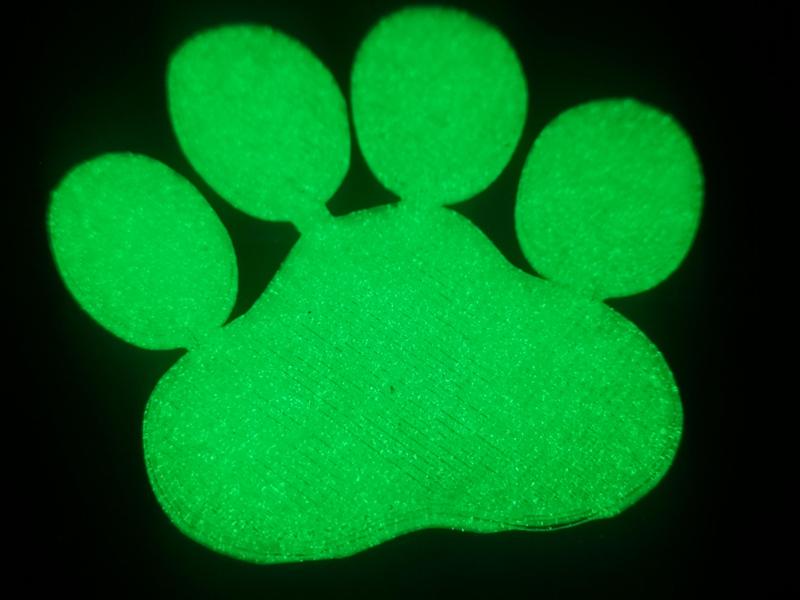 Glow-in-the-dark dog paw shape