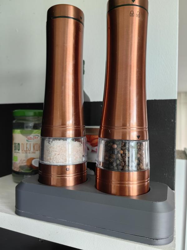 Stand for spice grinders