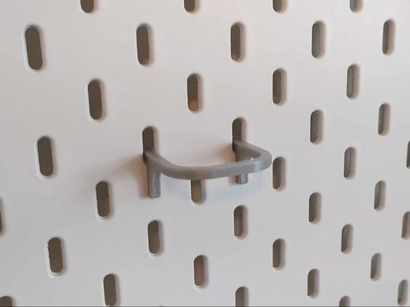 Skadis multifunction hinge