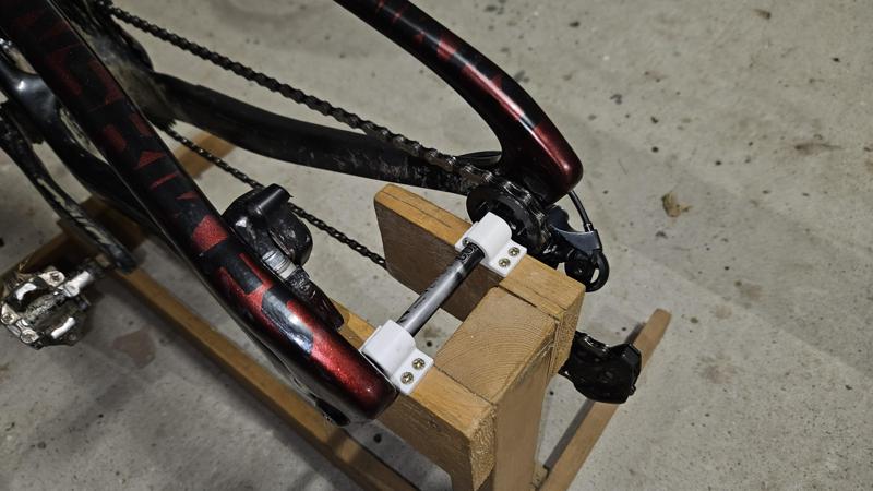 Holder (clip) for a 12mm bicycle axle.