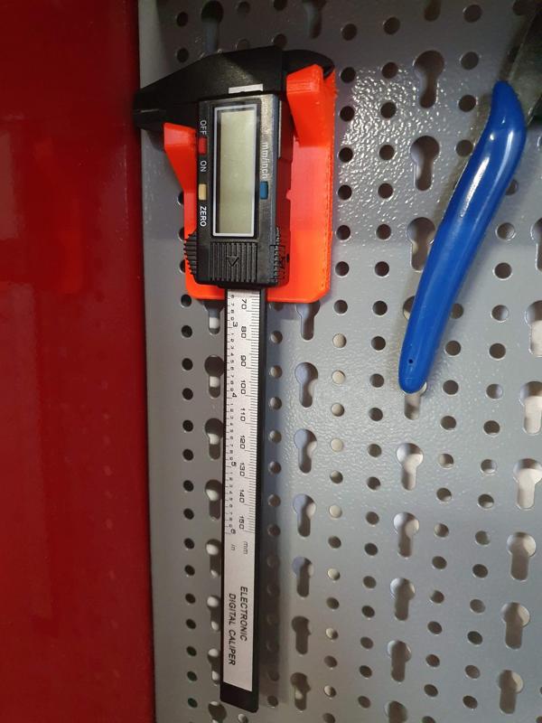 Caliper holder designed for peg board from Mars Svratka