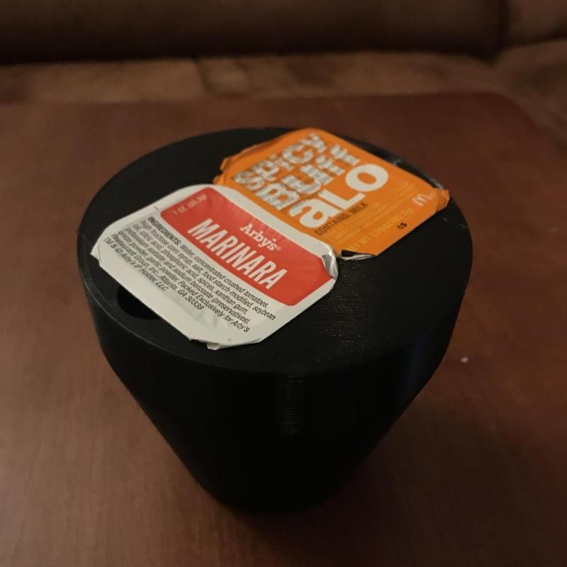 Double sauce holder with finger cut out