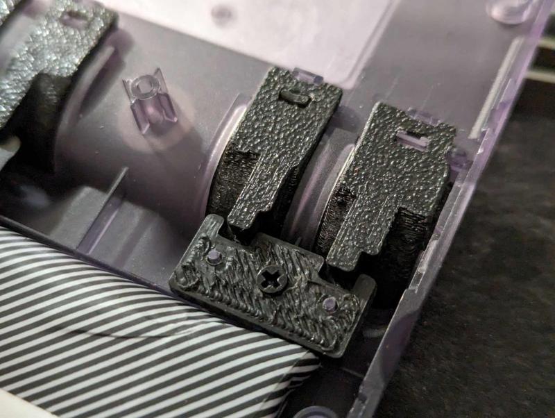 RG35XX Shoulder Button Retainer