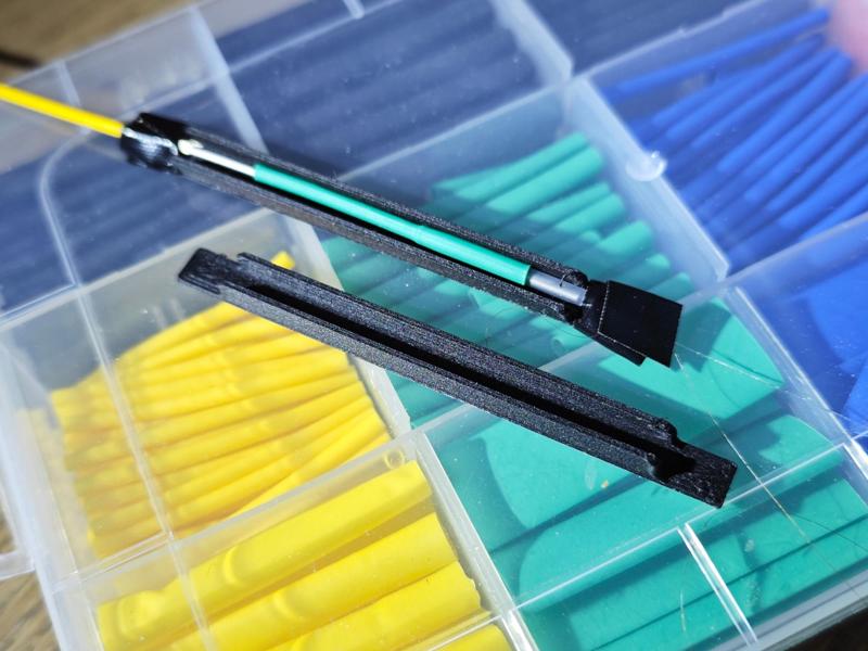 Optical fiber splice holder/protector