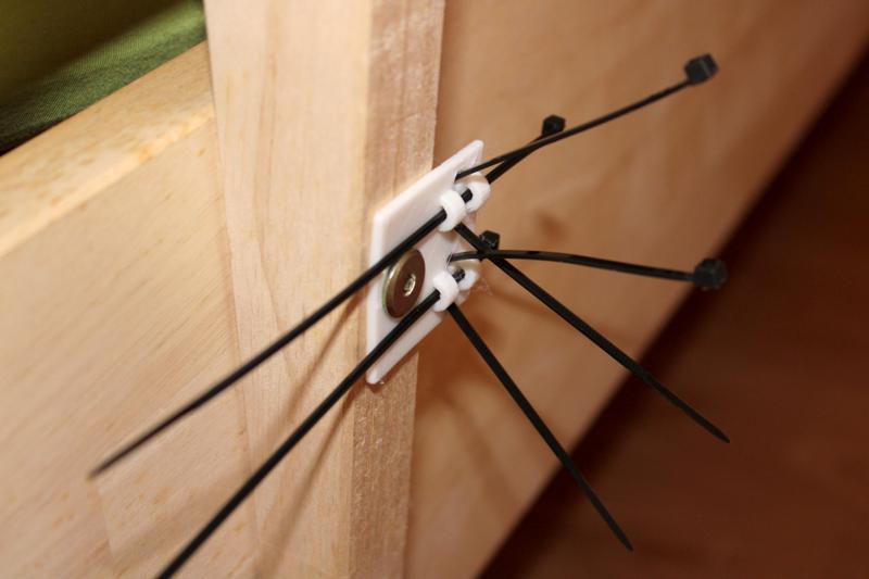 Zip-tie to furniture screw head mount