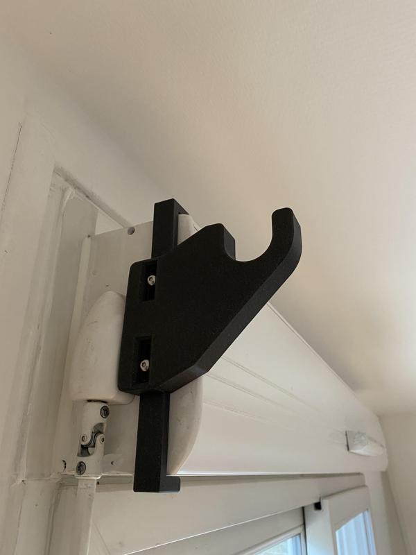 Curtain rod holder to shutter box