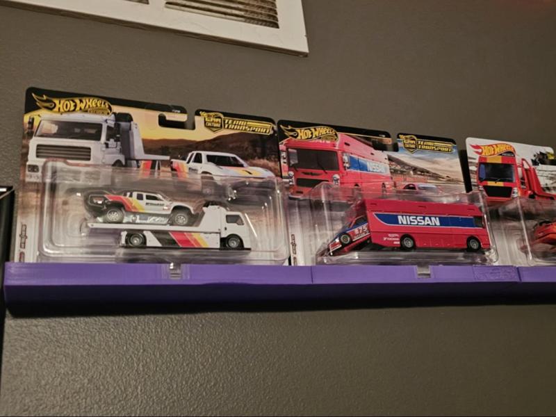 Hotwheels Team Transport Wall mount or desk stand.