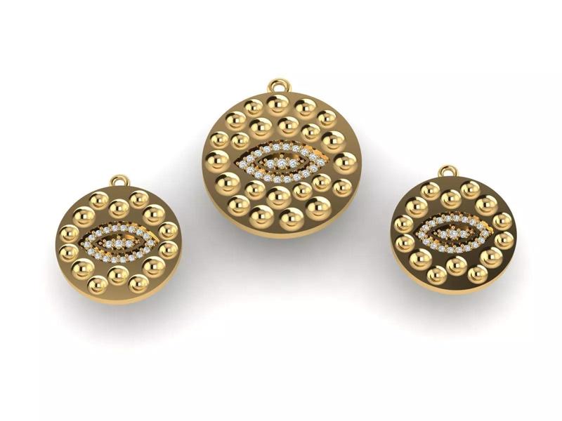 One eyed pendant and earring set