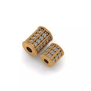 Jewelry two gold plated beads with diamonds