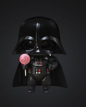 Baby Darth Vader holding lollipop