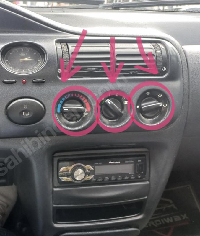 Ford Escort air conditioning button