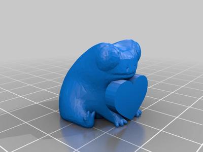 Fred the Frog but he's holding a heart