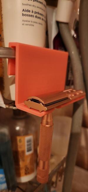 Safety razor holder with room for extra head