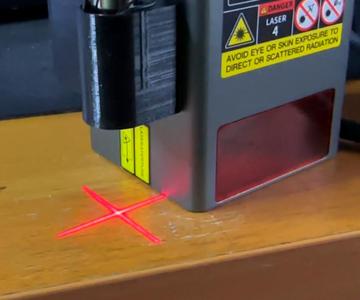 Cross laser body with batteries and switch