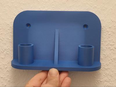 Wall mount for 2 vacuum cleaner nozzles