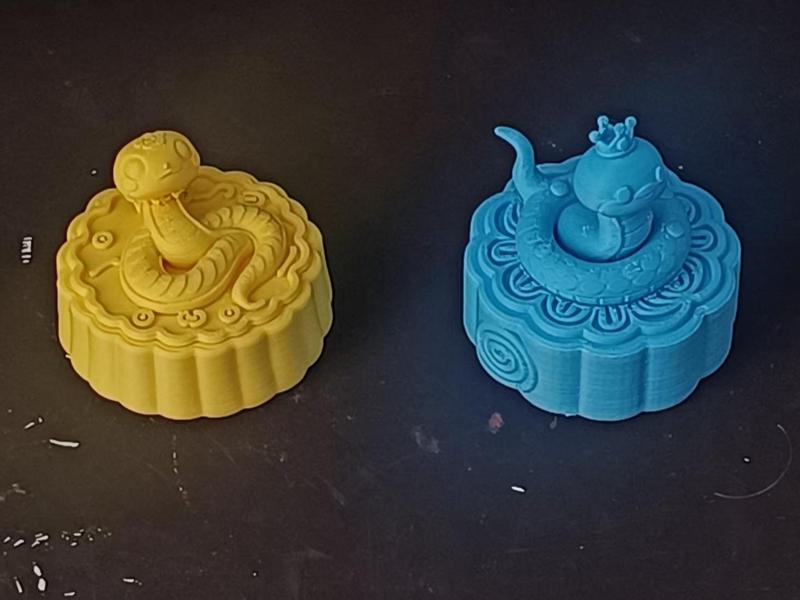 Two Year of the Snake themed mooncakes