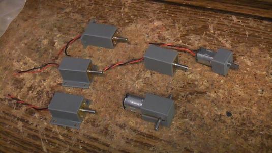 Dust cover and mount system for N20 type gear motors.