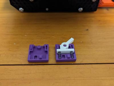 Spring loaded Lever fidget toy