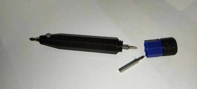 4mm bit screwdriver - magnet, rotating end, 2 bit storage.   