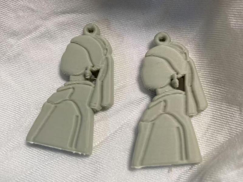 Three-dimensional Pearl Girl Earrings