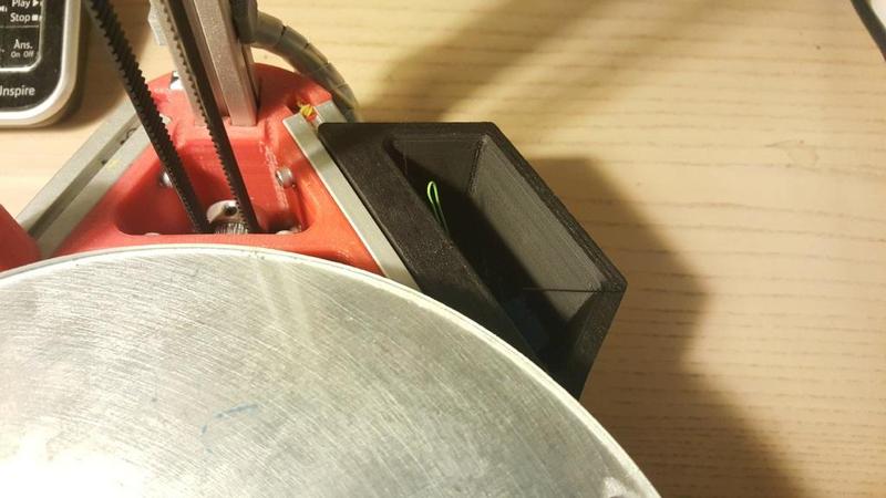 Extrusion-Mounted Print Waste Bin