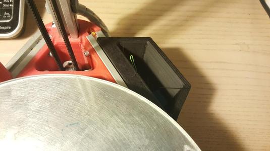 Extrusion-Mounted Print Waste Bin