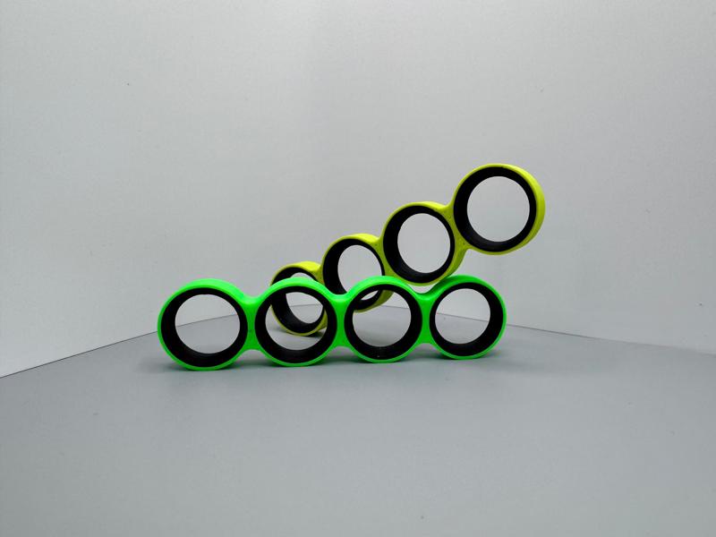 Spinning Fidget with Rotating Rings
