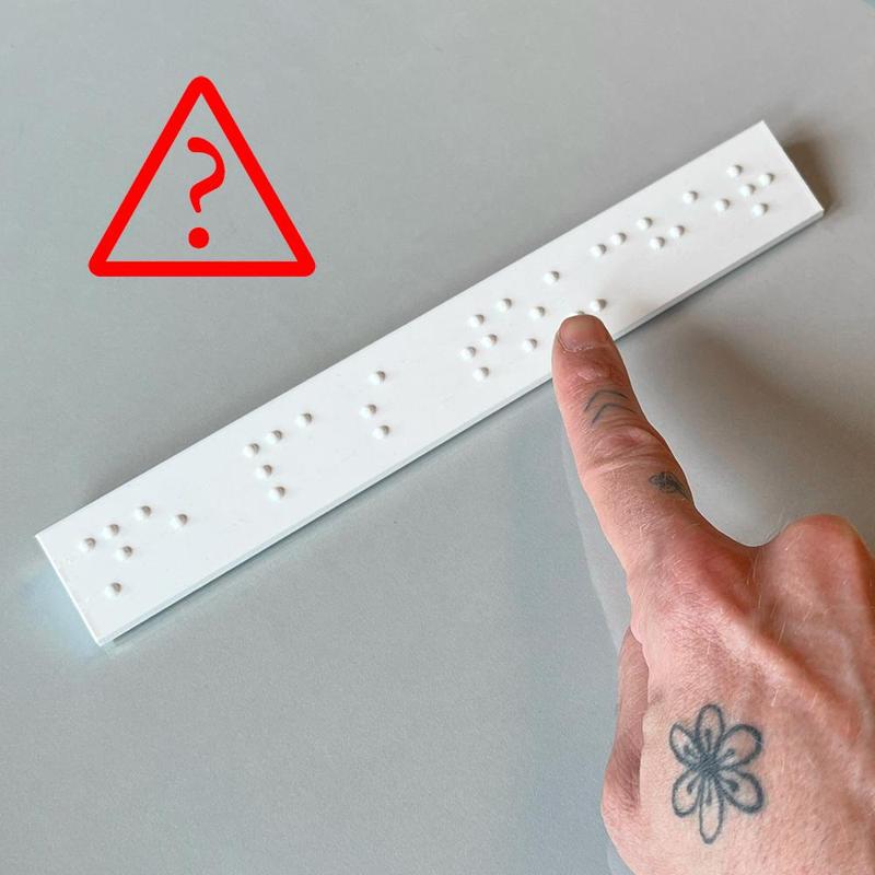 Do not touch in braille?!?