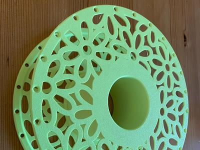 Spool with floral pattern