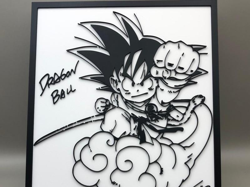 Young Songoku flying on a cloud