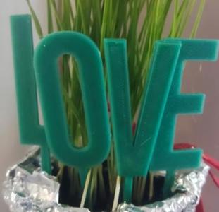LOVE inscription that can be stuck in the ground