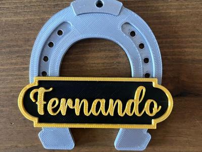 Horseshoe with nameplate