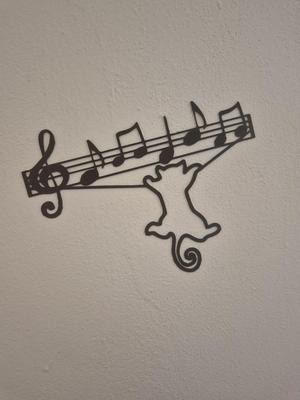 Musical Staff with Notes and Cat – Line Art Illustration