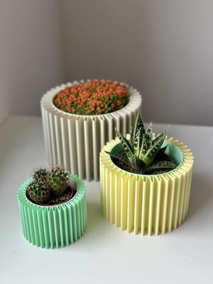 SLUNCE planters
