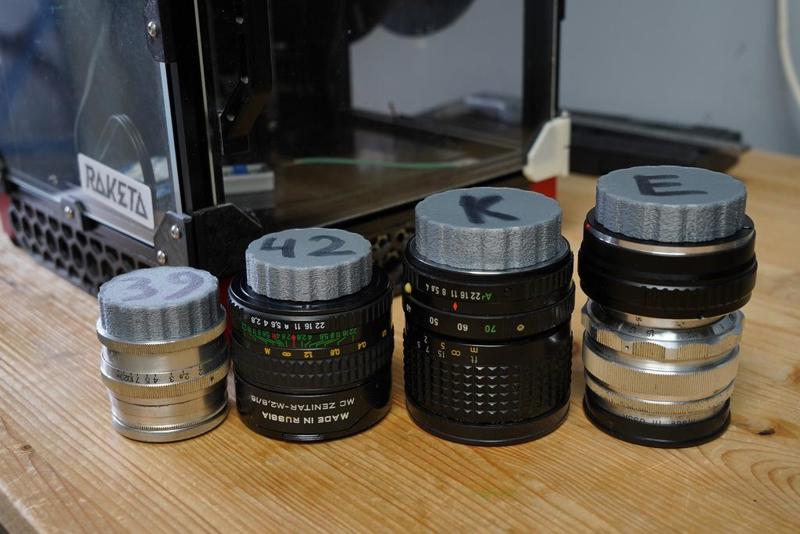 Camera lens rear caps