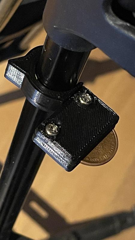 Coin clip for camera stand