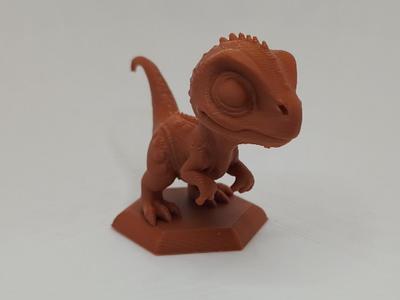 Chibi Velociraptor on a Base – Dino Figure