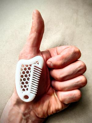 Massage pebbles as pendants or key rings