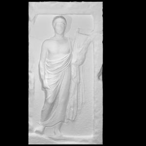 Gravestone depicting a young man holding a lyre