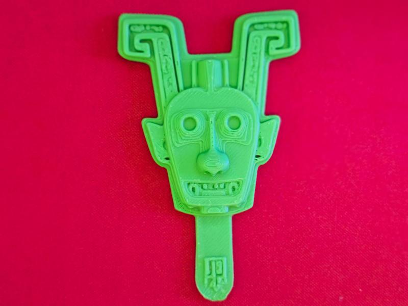 Shang Dynasty Double-Faced Divine Figure Bronze Head Ice Cream